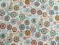Preview: Patchworkstoff aus der Serie Doodle Days mit Kreisen und Blumen auf weißem Untergrund von Makower.